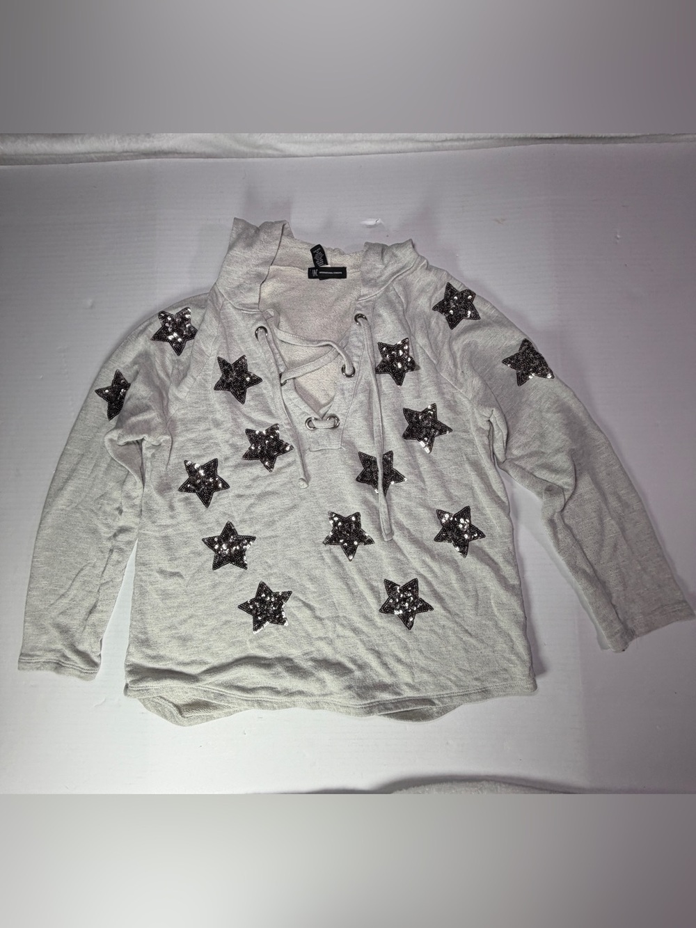 INC International Concepts Light Gray Lace-Up Sweatshirt with Black Sequin Stars